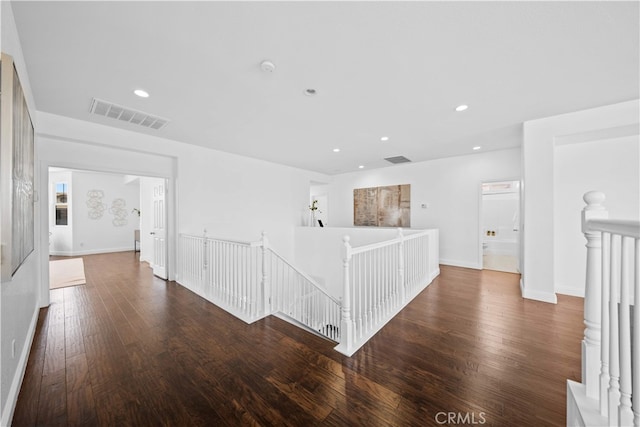 7265 Excelsior Dr, Eastvale, CA 92880 - hallway featuring an upstairs landing, wood-type flooring, and recessed lighting