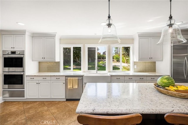 19180 Palm Vis, Yorba Linda, CA 92886 - kitchen featuring stainless steel appliances, a warming drawer, tasteful backsplash, hanging light fixtures, and recessed lighting