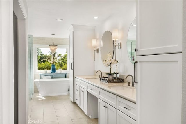19180 Palm Vis, Yorba Linda, CA 92886 - full bath with double vanity, a freestanding bath, tile patterned flooring, a chandelier, and recessed lighting
