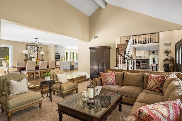 19180 Palm Vis, Yorba Linda, CA 92886 - living area with stairway, high vaulted ceiling, a chandelier, and beam ceiling