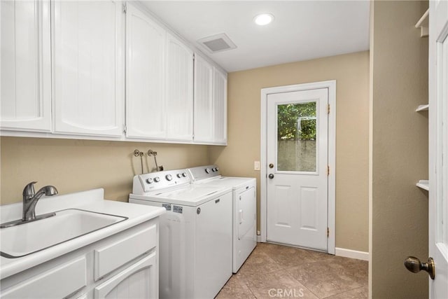 19180 Palm Vis, Yorba Linda, CA 92886 - laundry area with cabinet space, washing machine and clothes dryer, and light tile patterned floors