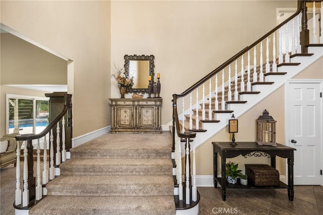 19180 Palm Vis, Yorba Linda, CA 92886 - stairway featuring a high ceiling and baseboards