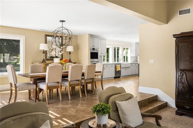 19180 Palm Vis, Yorba Linda, CA 92886 - dining space featuring a chandelier, recessed lighting, and light tile patterned flooring