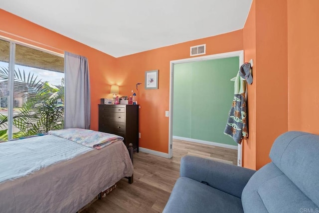 218 Holiday Way, Oceanside, CA 92057 - bedroom featuring baseboards and wood finished floors