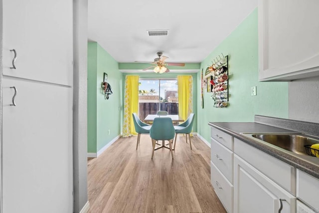 218 Holiday Way, Oceanside, CA 92057 - dining room with light wood-style flooring and ceiling fan