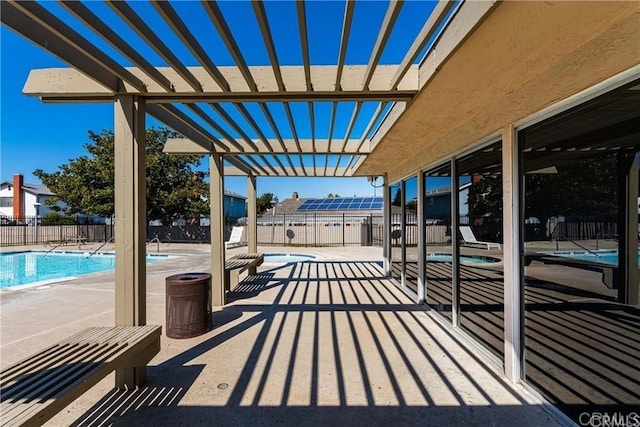 218 Holiday Way, Oceanside, CA 92057 - fenced backyard featuring a community pool, a patio area, and a pergola