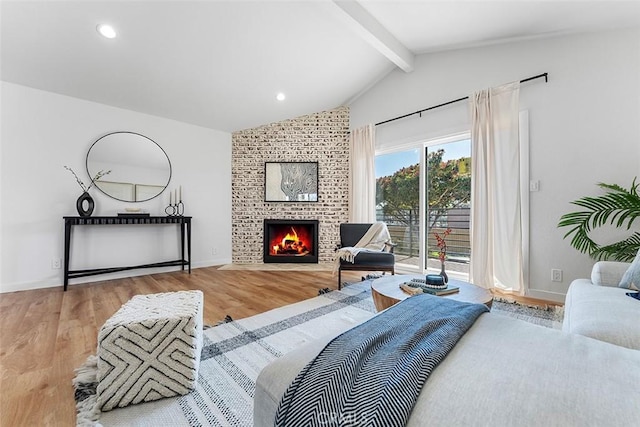 15016 Firmona Ave, Lawndale, CA 90260 - bedroom featuring access to outside, a fireplace, wood finished floors, and recessed lighting