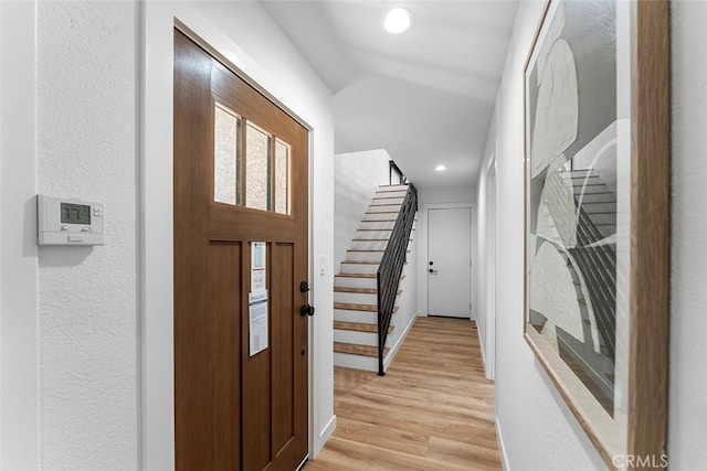 15016 Firmona Ave, Lawndale, CA 90260 - entryway with light wood-style flooring, stairway, and recessed lighting