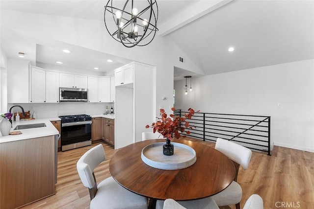 15016 Firmona Ave, Lawndale, CA 90260 - dining room featuring a chandelier, light wood-style floors, and recessed lighting