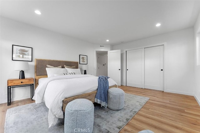 15016 Firmona Ave, Lawndale, CA 90260 - bedroom with light wood finished floors, recessed lighting, and a closet