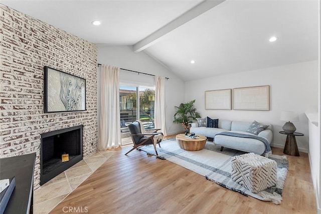 15016 Firmona Ave, Lawndale, CA 90260 - living room featuring wood finished floors, a fireplace, and recessed lighting