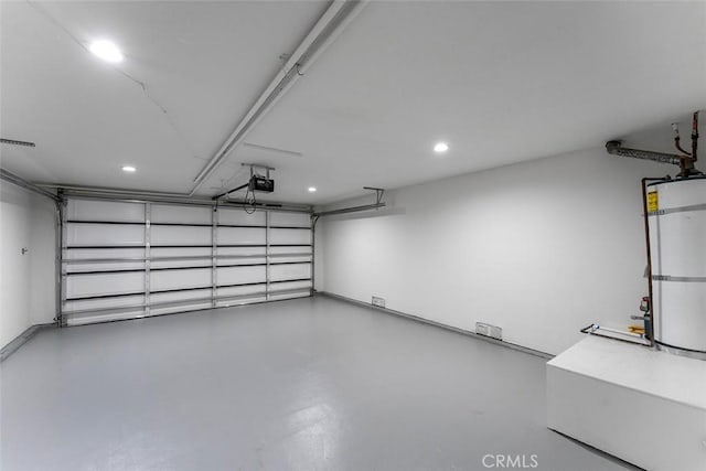 15016 Firmona Ave, Lawndale, CA 90260 - garage with secured water heater, a garage door opener, and recessed lighting