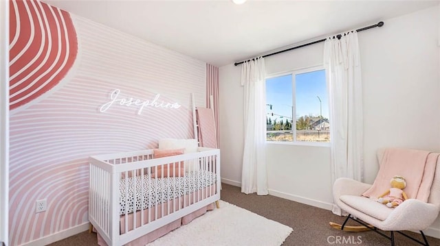 766 Pico Pl, Chico, CA 95928 - carpeted bedroom featuring baseboards and a nursery area
