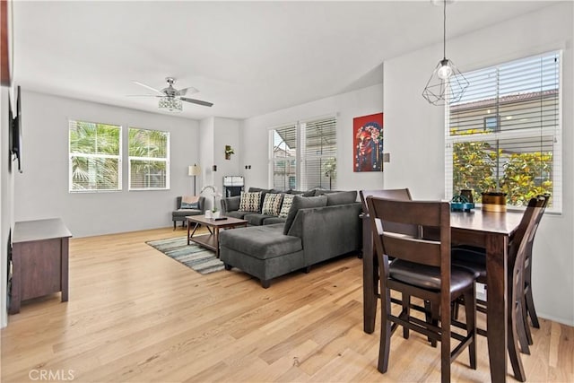 168 Royal Way, Upland, CA 91786 - living room with light wood-style flooring, ceiling fan, and healthy amount of natural light