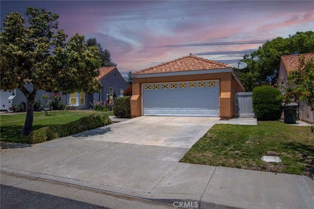31858 Corte Priego, Temecula, CA 92592 - view of front of house with a tiled roof, stucco siding, a garage, a front lawn, and concrete driveway