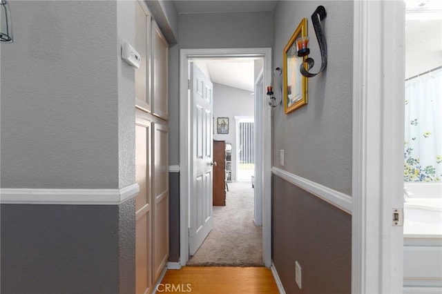 31858 Corte Priego, Temecula, CA 92592 - corridor featuring light wood-style flooring and a textured wall
