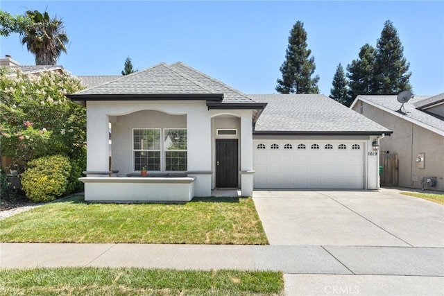 1619 Harvest Glen Dr, Chico, CA 95928 - view of front of house with an attached garage, concrete driveway, roof with shingles, and a front yard