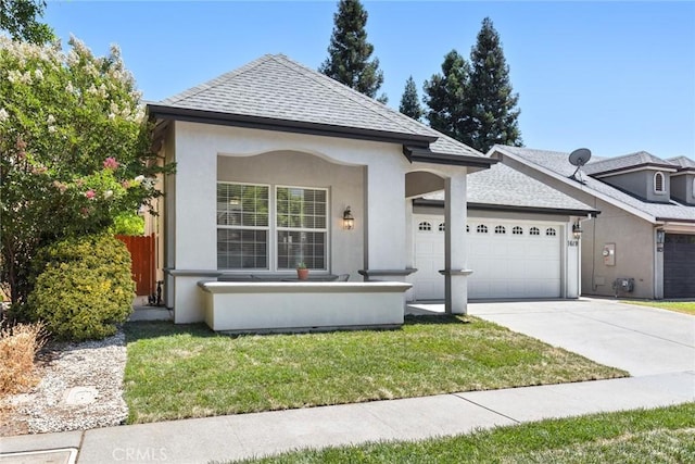 1619 Harvest Glen Dr, Chico, CA 95928 - view of front of home with an attached garage, concrete driveway, stucco siding, and roof with shingles