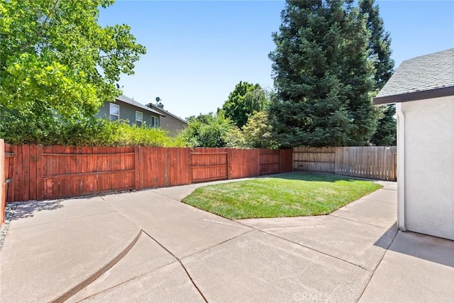 1619 Harvest Glen Dr, Chico, CA 95928 - fenced backyard with a patio