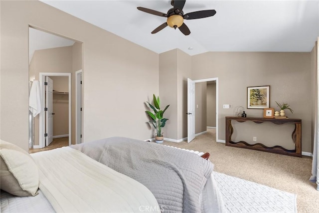 1619 Harvest Glen Dr, Chico, CA 95928 - bedroom featuring vaulted ceiling, light colored carpet, ceiling fan, and a walk in closet