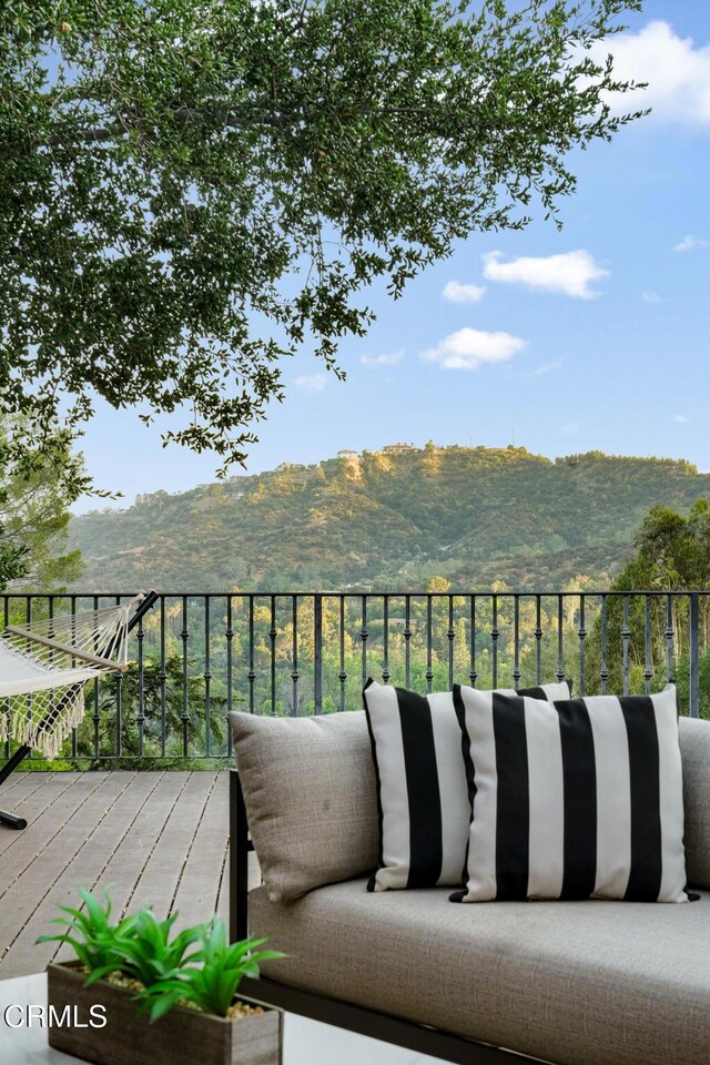 1897 Braemar Rd, Pasadena, CA 91103 - wooden deck featuring a mountain view and outdoor lounge area