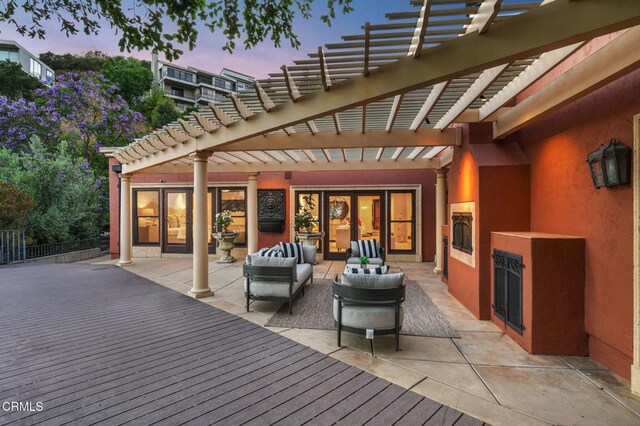 1897 Braemar Rd, Pasadena, CA 91103 - deck at dusk featuring a pergola and an outdoor hangout area