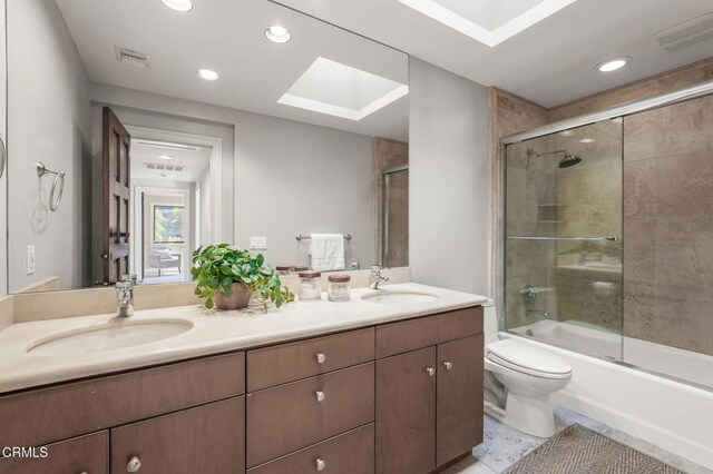 1897 Braemar Rd, Pasadena, CA 91103 - full bath featuring double vanity, combined bath / shower with glass door, and recessed lighting