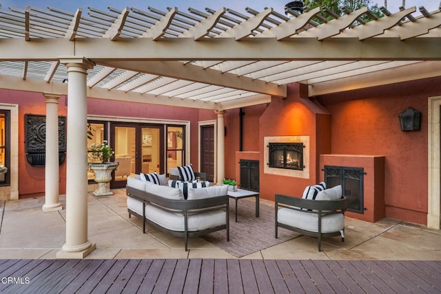 1897 Braemar Rd, Pasadena, CA 91103 - wooden terrace featuring an outdoor living space with a fireplace and a pergola
