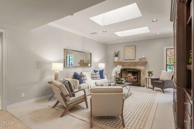 1897 Braemar Rd, Pasadena, CA 91103 - living area with a skylight, a high end fireplace, light colored carpet, crown molding, and recessed lighting