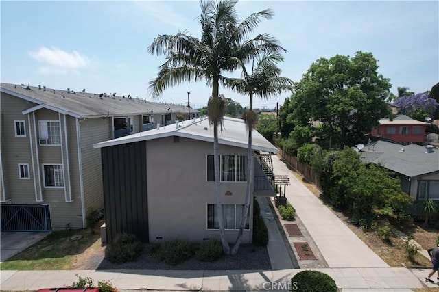 1445 Coronado Ave, Long Beach, CA 90804 - view of side of home featuring stucco siding
