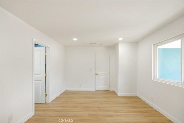 934 W Calora St, San Dimas, CA 91773 - empty room with light wood finished floors and recessed lighting