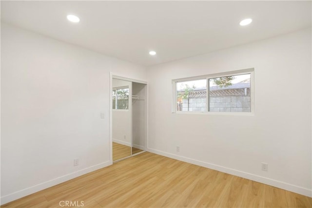 934 W Calora St, San Dimas, CA 91773 - unfurnished bedroom featuring light wood-style floors, recessed lighting, and a closet