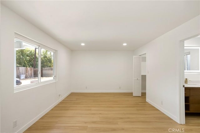 934 W Calora St, San Dimas, CA 91773 - unfurnished bedroom featuring light wood-style flooring, recessed lighting, and ensuite bathroom