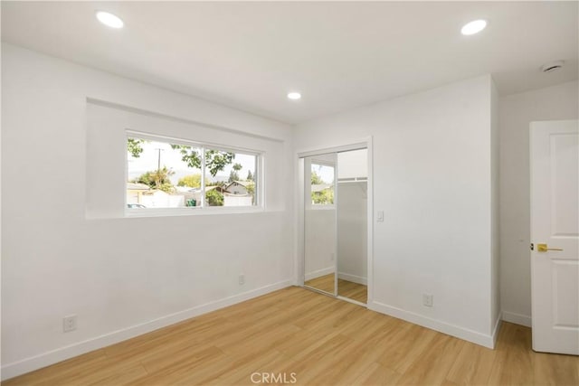 934 W Calora St, San Dimas, CA 91773 - unfurnished bedroom with light wood-style flooring, recessed lighting, and a closet