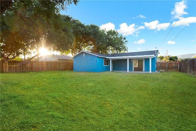 934 W Calora St, San Dimas, CA 91773 - back of house with a fenced backyard
