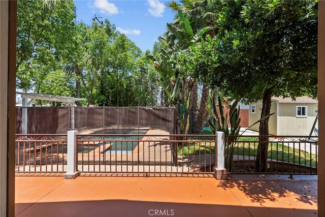 15711 Hiawatha St, Granada Hills, CA 91344 - view of swimming pool with a fenced backyard, a shed, and a patio