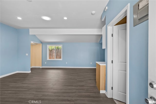 15711 Hiawatha St, Granada Hills, CA 91344 - spare room with lofted ceiling, recessed lighting, dark wood finished floors, and a smoke detector