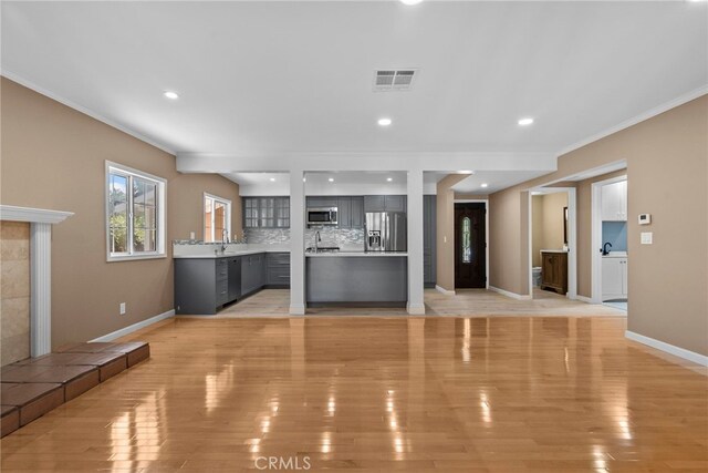 15711 Hiawatha St, Granada Hills, CA 91344 - unfurnished living room featuring crown molding, light wood-style floors, and recessed lighting