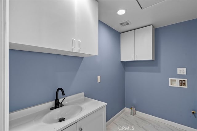 15711 Hiawatha St, Granada Hills, CA 91344 - laundry area featuring hookup for a washing machine, hookup for a gas dryer, and light marble finish floors