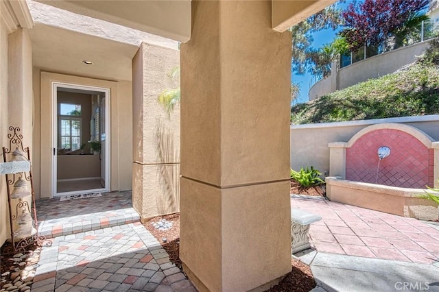 17 Siena, Laguna Niguel, CA 92677 - entrance to property featuring stucco siding and a patio area