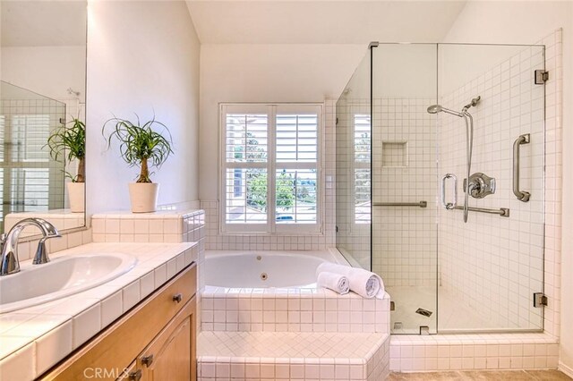 17 Siena, Laguna Niguel, CA 92677 - bathroom with a jetted tub, a shower stall, and vanity