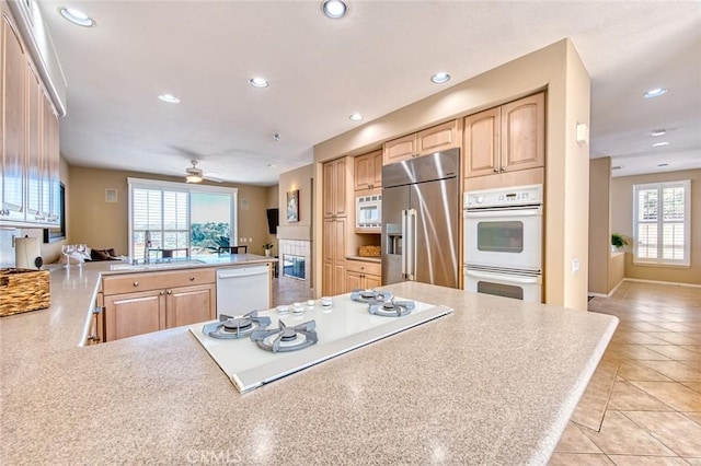 17 Siena, Laguna Niguel, CA 92677 - kitchen featuring white appliances, light brown cabinets, a peninsula, recessed lighting, and ceiling fan