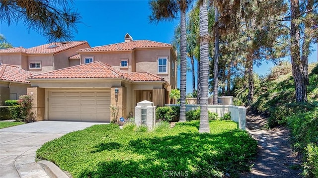 17 Siena, Laguna Niguel, CA 92677 - mediterranean / spanish-style home with a garage, stucco siding, concrete driveway, a tiled roof, and a chimney