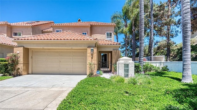 17 Siena, Laguna Niguel, CA 92677 - mediterranean / spanish house featuring a garage, stucco siding, driveway, and a tile roof