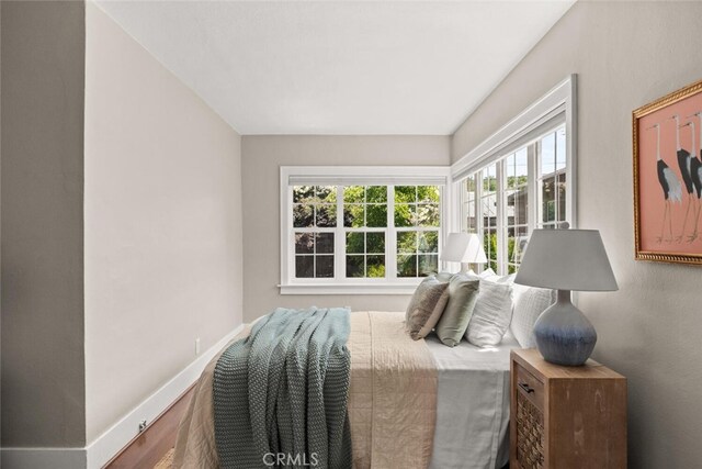 375 E 1st Ave, Chico, CA 95926 - bedroom featuring wood finished floors and baseboards