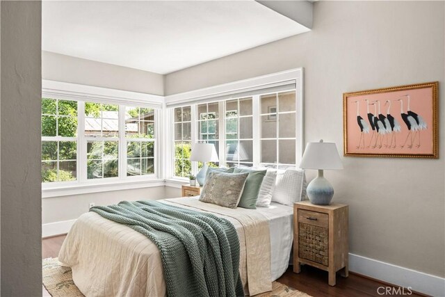 375 E 1st Ave, Chico, CA 95926 - bedroom featuring baseboards and wood finished floors
