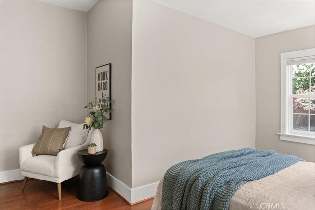 375 E 1st Ave, Chico, CA 95926 - bedroom with baseboards and wood finished floors