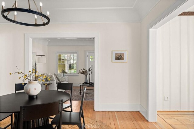 375 E 1st Ave, Chico, CA 95926 - dining space with light wood-type flooring and a chandelier
