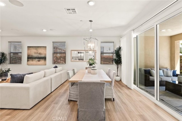 27636 S Evergreen Pl, San Pedro, CA 90732 - dining room with a chandelier, recessed lighting, and light wood-type flooring