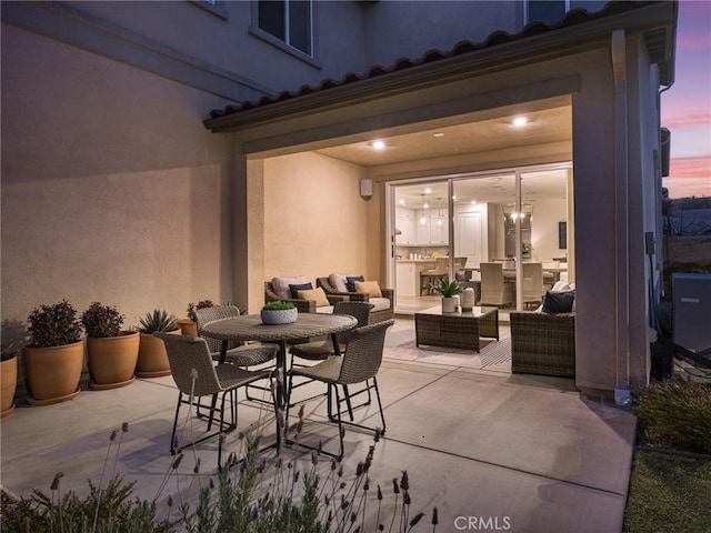 27636 S Evergreen Pl, San Pedro, CA 90732 - patio terrace at dusk featuring a patio area and an outdoor living space